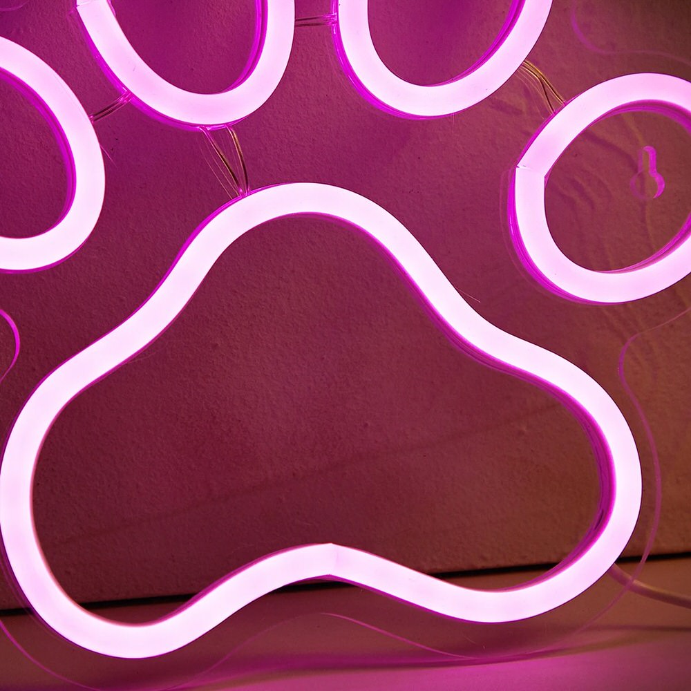 Pink Cat Paw LED Neon Sign — Warm LED Mood Lighting for Bedside — Lifestyle 1