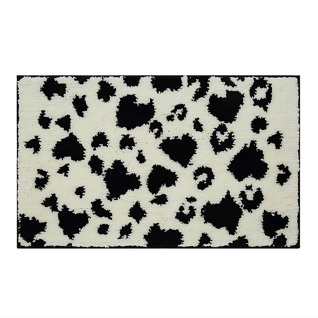 Cow Print B&W Tufted Rug — Soft Accent Rug for Bedroom Layering — Front view